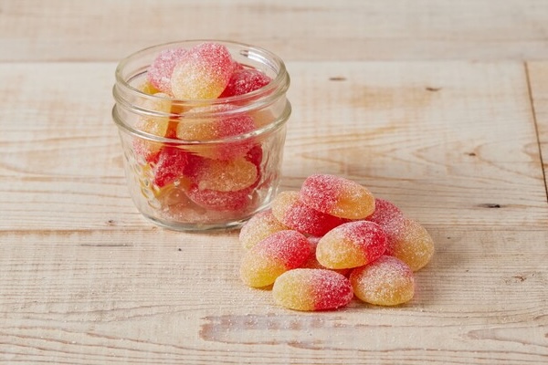 A photo of a cup of Sweet Peach Candy