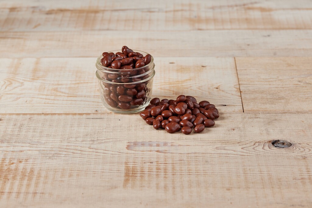 A photo of a cup of Chocolate Covered Raisins
