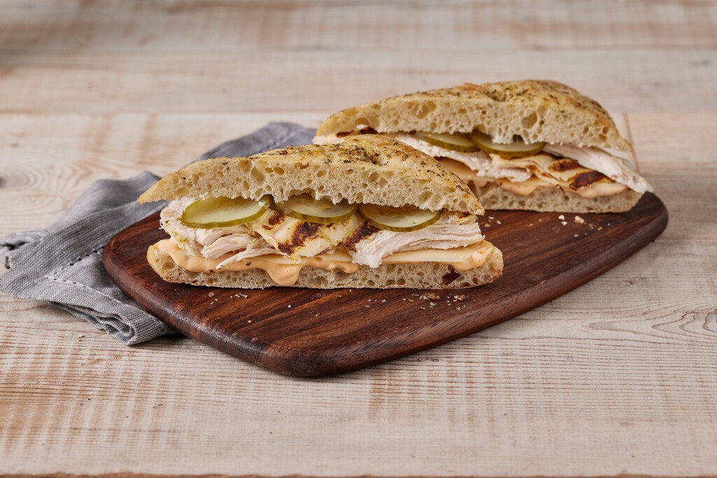 A photo of a Chicken & Swiss on Focaccia Sandwich