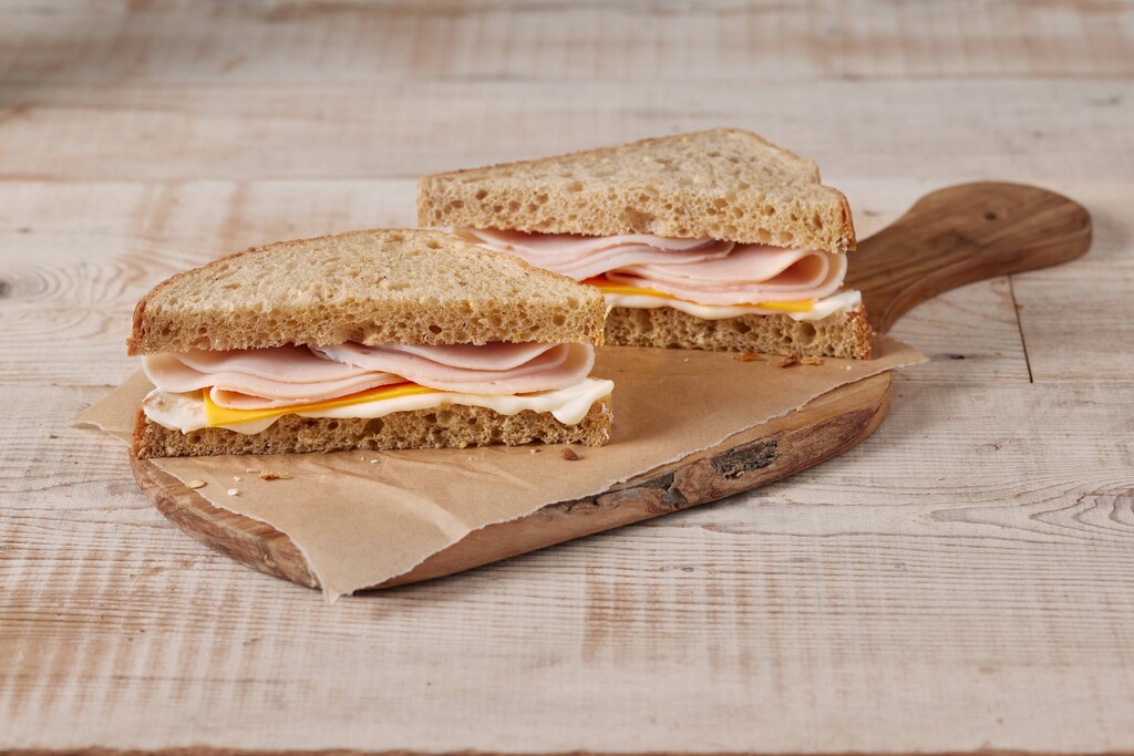 A photo of a turkey & cheese sandwich